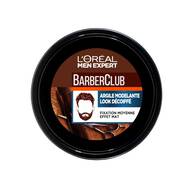 Couvercle d'un pot d'Argile Modelante L'Oreal Men Expert BarberClub, effet mat et fixation moyenne, decore d'accessoires de barbier.