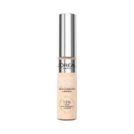 Photo du tube Accord Parfait Serum Anti-Cernes sur fond blanc. Le flacon transparent laisse voir la texture beige et possede un bouchon argente brillant. L'etiquette precise la formule enrichie a 1,5 % d'acide hyaluronique et de cafeine.