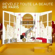 Calendrier de l'Avent L'Oreal Paris ferme, entoure de 24 produits de maquillage, soins visage et capillaires. Texte : « 24 PRODUITS A DECOUVRIR MAQUILLAGE, SOINS DU VISAGE ET SOINS CAPILLAIRES.»​