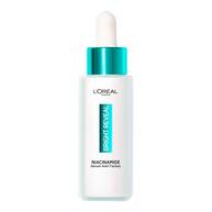 Un flacon du serum L’Oreal Paris Bright Reveal a la niacinamide, avec pipette turquoise, place au centre d’un fond blanc epure.