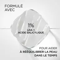 Gros plan sur la texture de la formule gel-creme indiquant « 1% LHA + Acide Salicylique » pour reequilibrer la peau.​