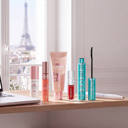 Visuel publicitaire pour L'Oreal Men Expert. Sur la partie gauche, une pastille bleue promotionnelle annonce « Une trousse Men Expert OFFERTE des 40€ d'achats, dans la gamme HOMME » a cote de produits Barber Club et Power Age. La moitie droite de l'image est un espace vide sur un mur en beton gris avec une fenetre qui donne sur la Tour Eiffel.