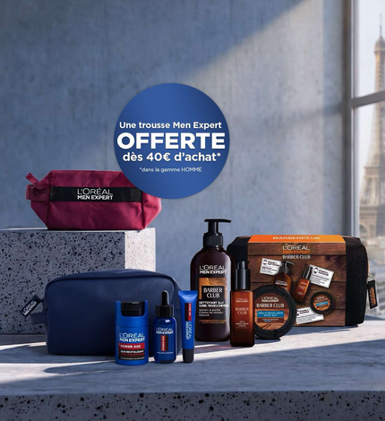 Visuel publicitaire pour L'Oreal Men Expert. Sur la partie gauche, une pastille bleue promotionnelle annonce « Une trousse Men Expert OFFERTE des 40€ d'achats, dans la gamme HOMME » a cote de produits Barber Club et Power Age. La moitie droite de l'image est un espace vide sur un mur en beton gris avec une fenetre qui donne sur la Tour Eiffel.